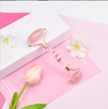 Rouleau de jade de masseur de visage à quartz rose 3D pour les yeux du visage